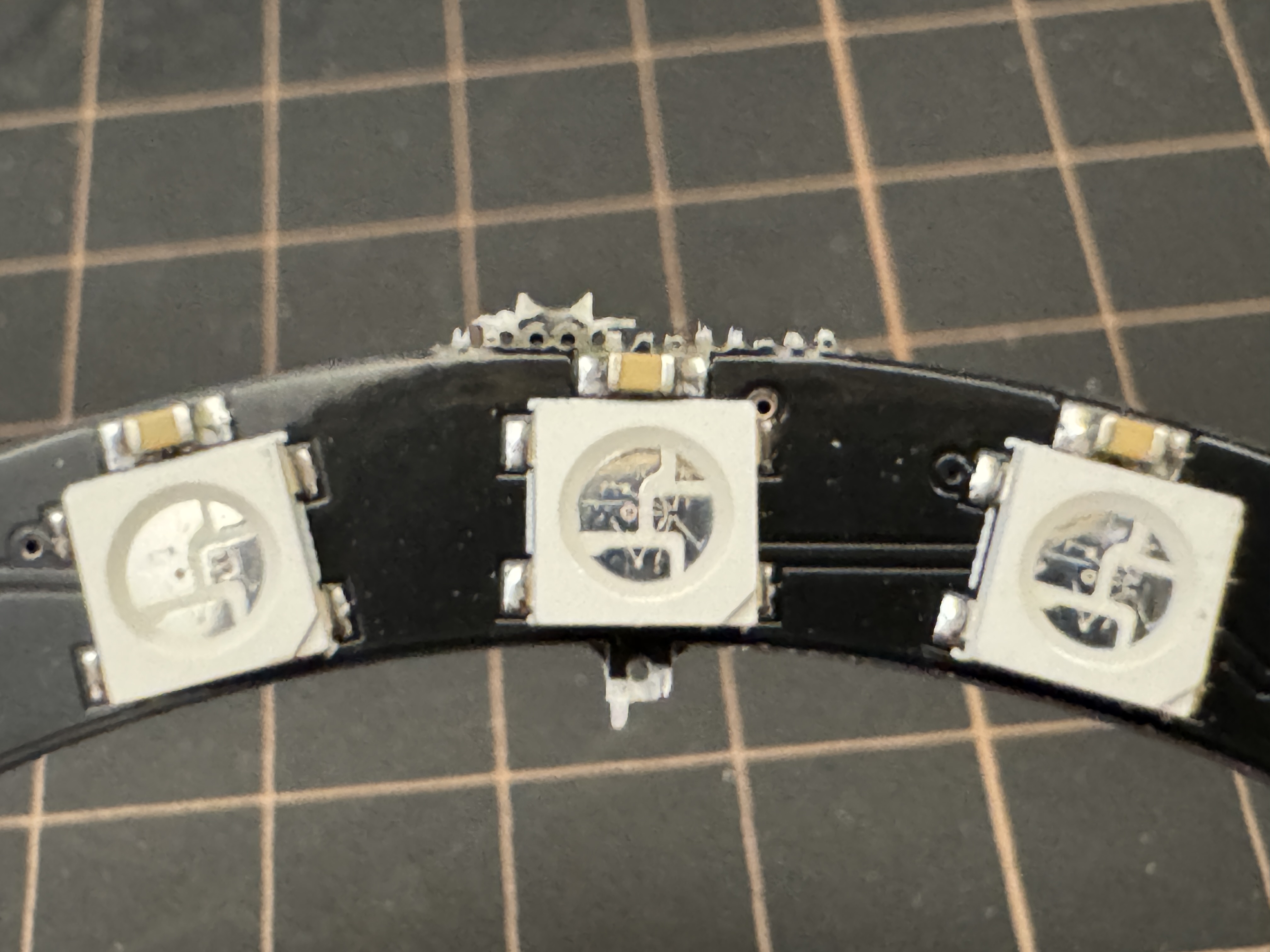 Cleaning up the rough spots on most of the PCB's to ensure proper fitting of the components, before soldering everything.